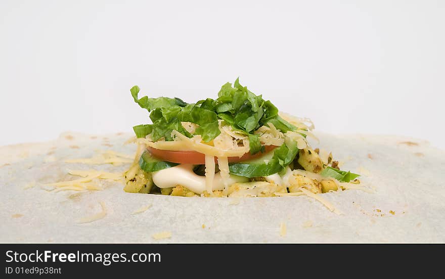 Fresh vegitables with chicken and lettuce cut on white background. Fresh vegitables with chicken and lettuce cut on white background