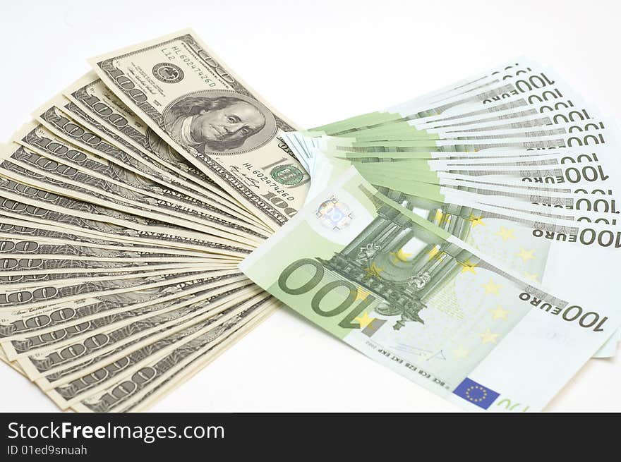 Many Euro And Dollars On White Background