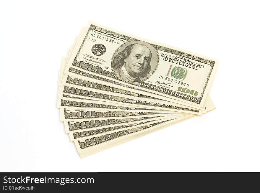 Many banknotes (100 Dollars) in pile isolated on white background. Many banknotes (100 Dollars) in pile isolated on white background