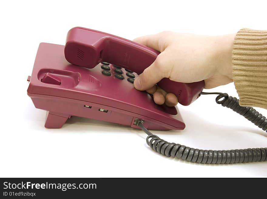 Traditional red phone with male hand pick up isolated on white background. Traditional red phone with male hand pick up isolated on white background