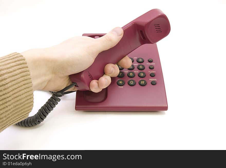 Traditional red phone with male hand pick up isolated on white background. Traditional red phone with male hand pick up isolated on white background