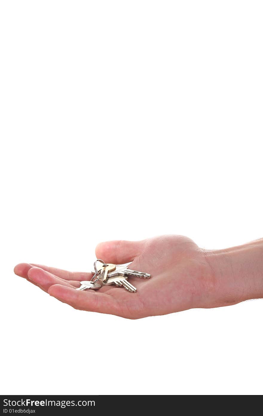 A hand is giving someone a bunch of keys. Isolated over white. A hand is giving someone a bunch of keys. Isolated over white.