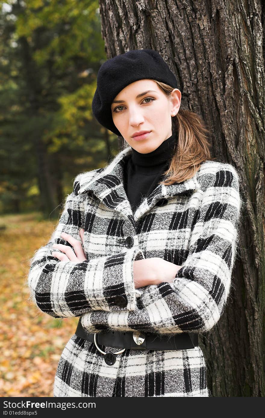 Young Woman In Autumnal Park