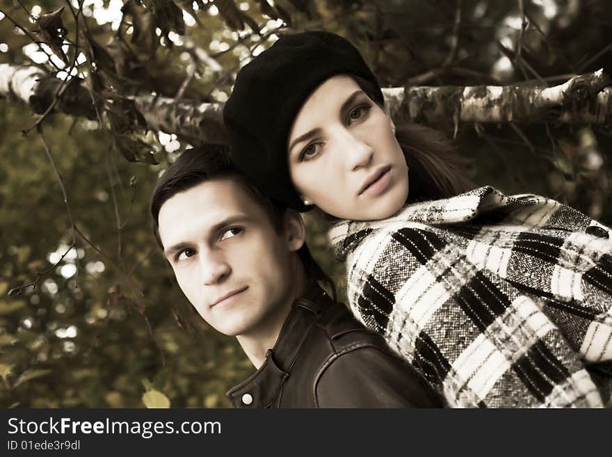 Loving couple in autumnal park