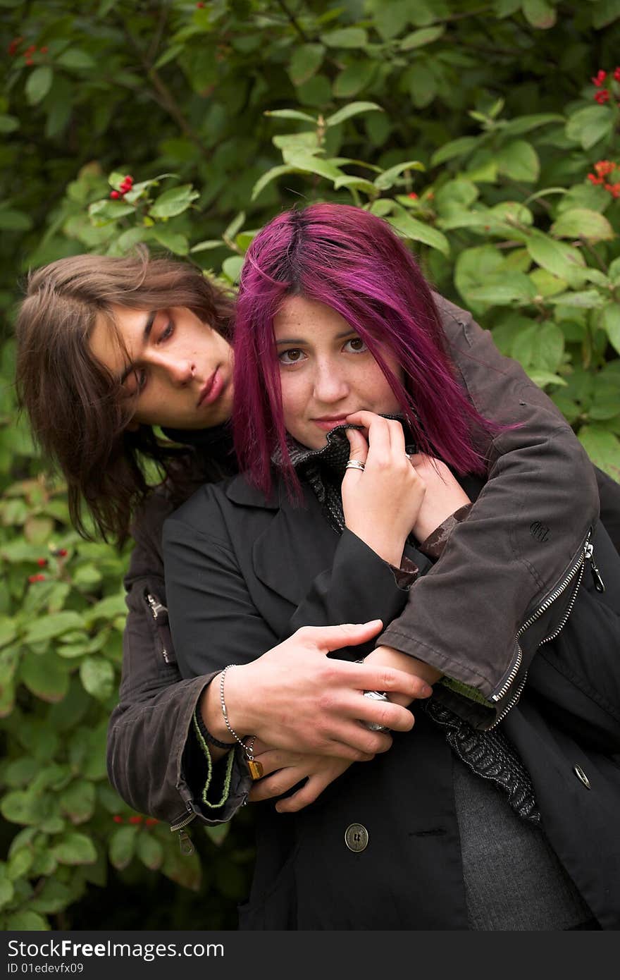 Young and beautiful boy  and girl  walking in park. Young and beautiful boy  and girl  walking in park