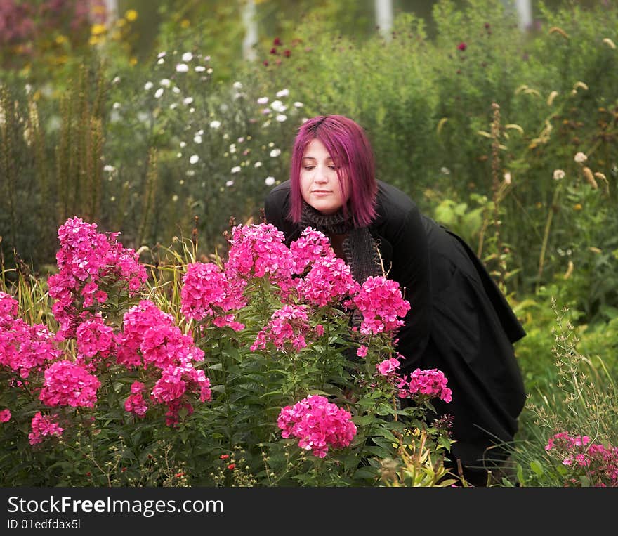 Woman relaxing in the summer park