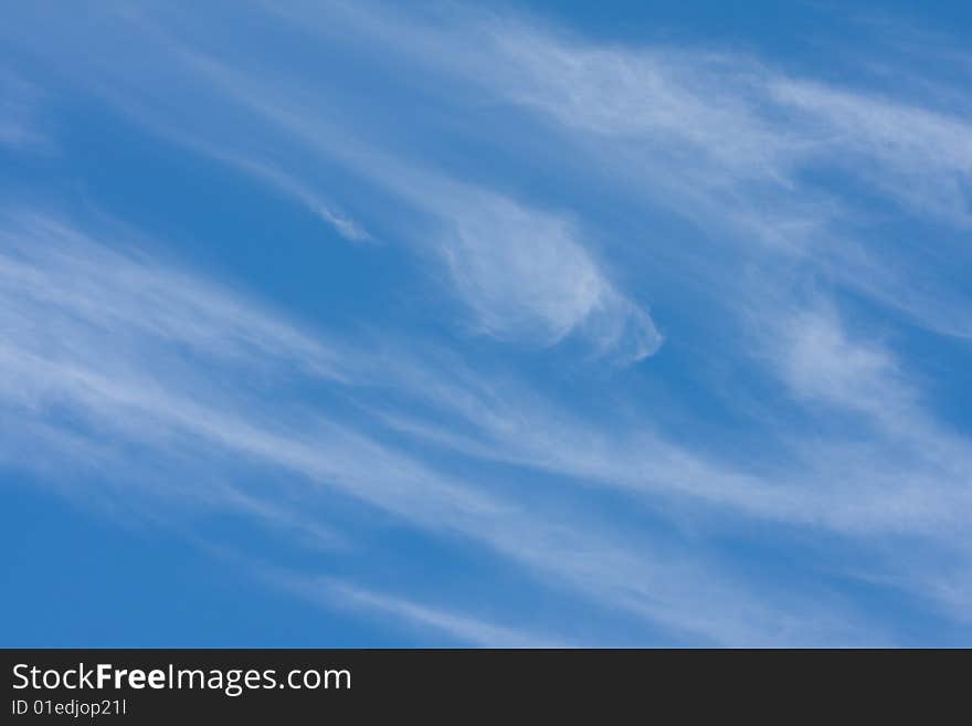 Beautiful clouds in a blue sky - background