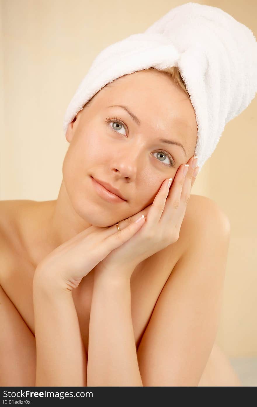 Portrait of the beautiful girl in a towel. Portrait of the beautiful girl in a towel