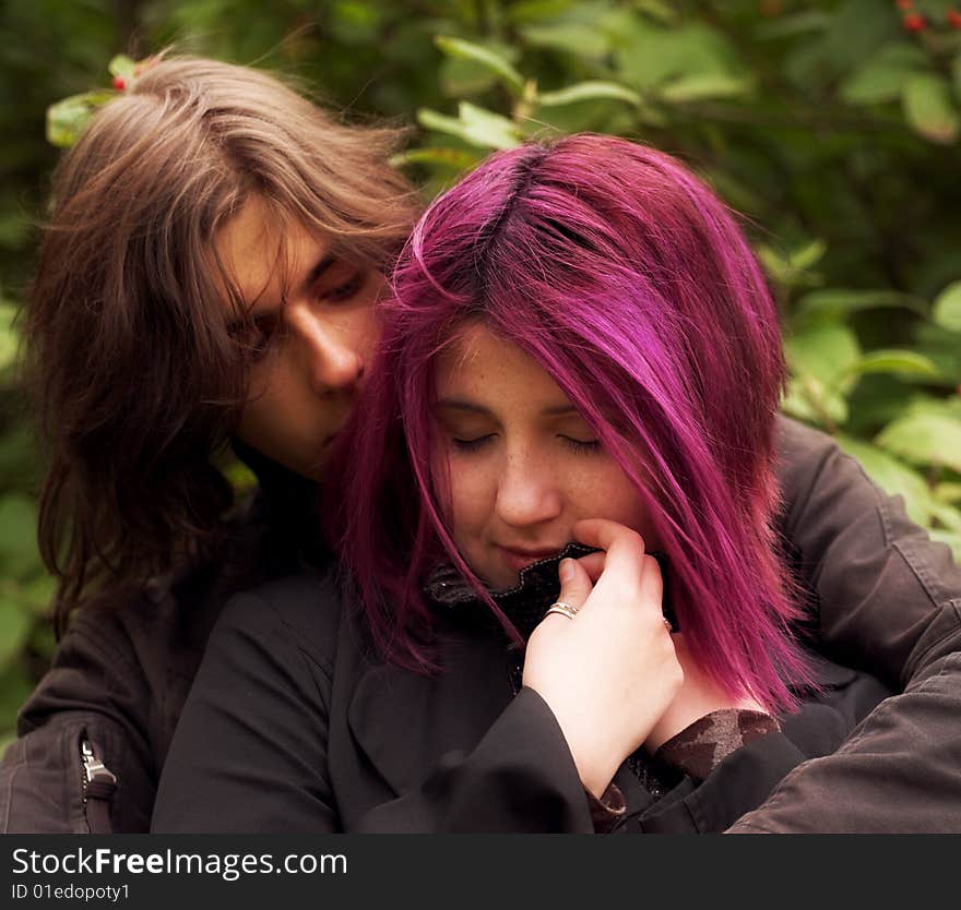 Young and beautiful boy  and girl  walking in park. Young and beautiful boy  and girl  walking in park