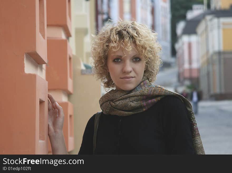 Curly girl in city