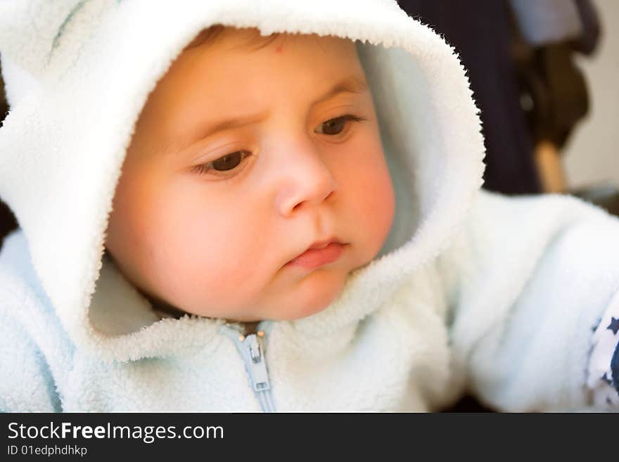 Close-up studio portrait of a young child. Close-up studio portrait of a young child