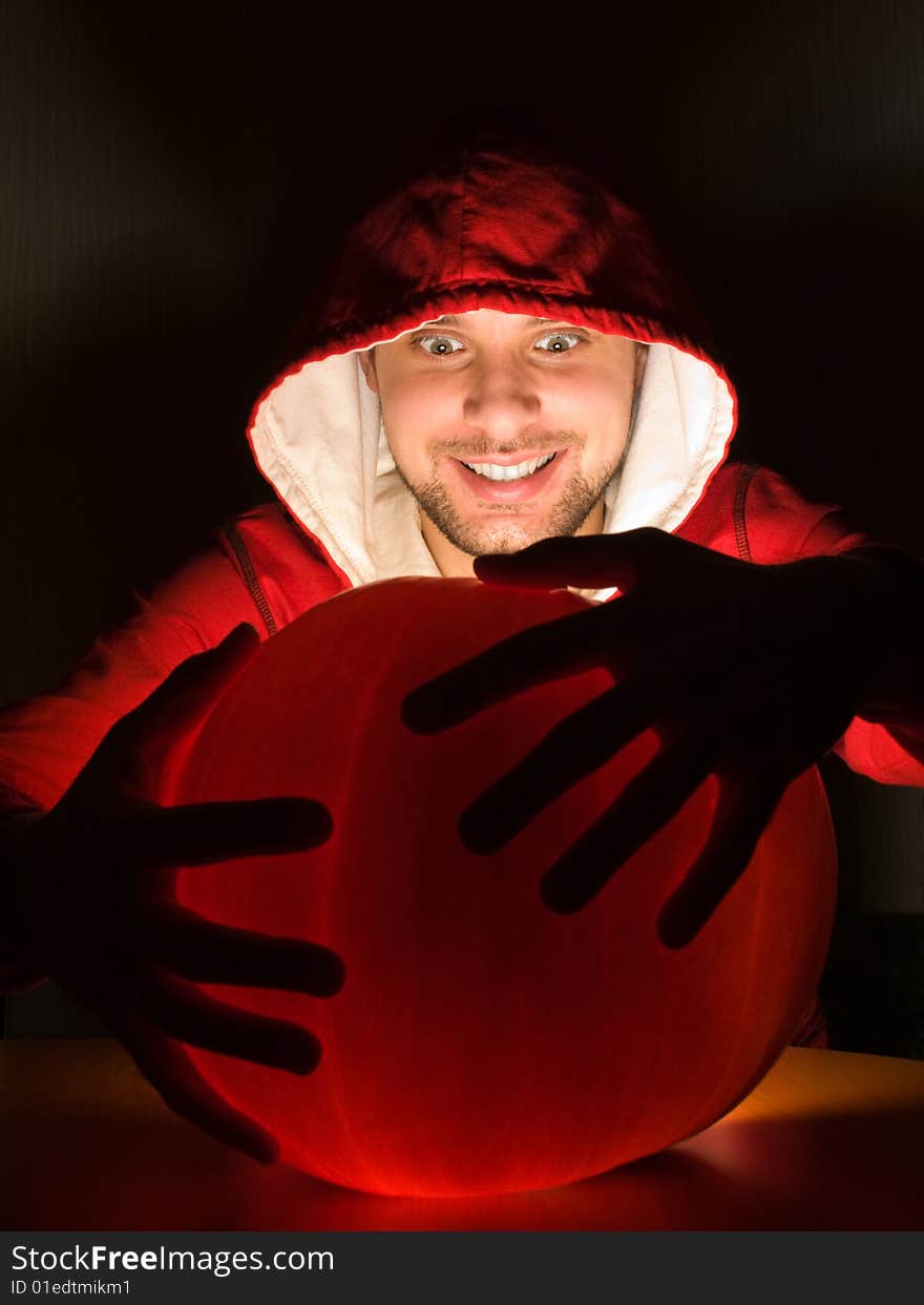 Awesome man holds ball of light in his hands. Awesome man holds ball of light in his hands