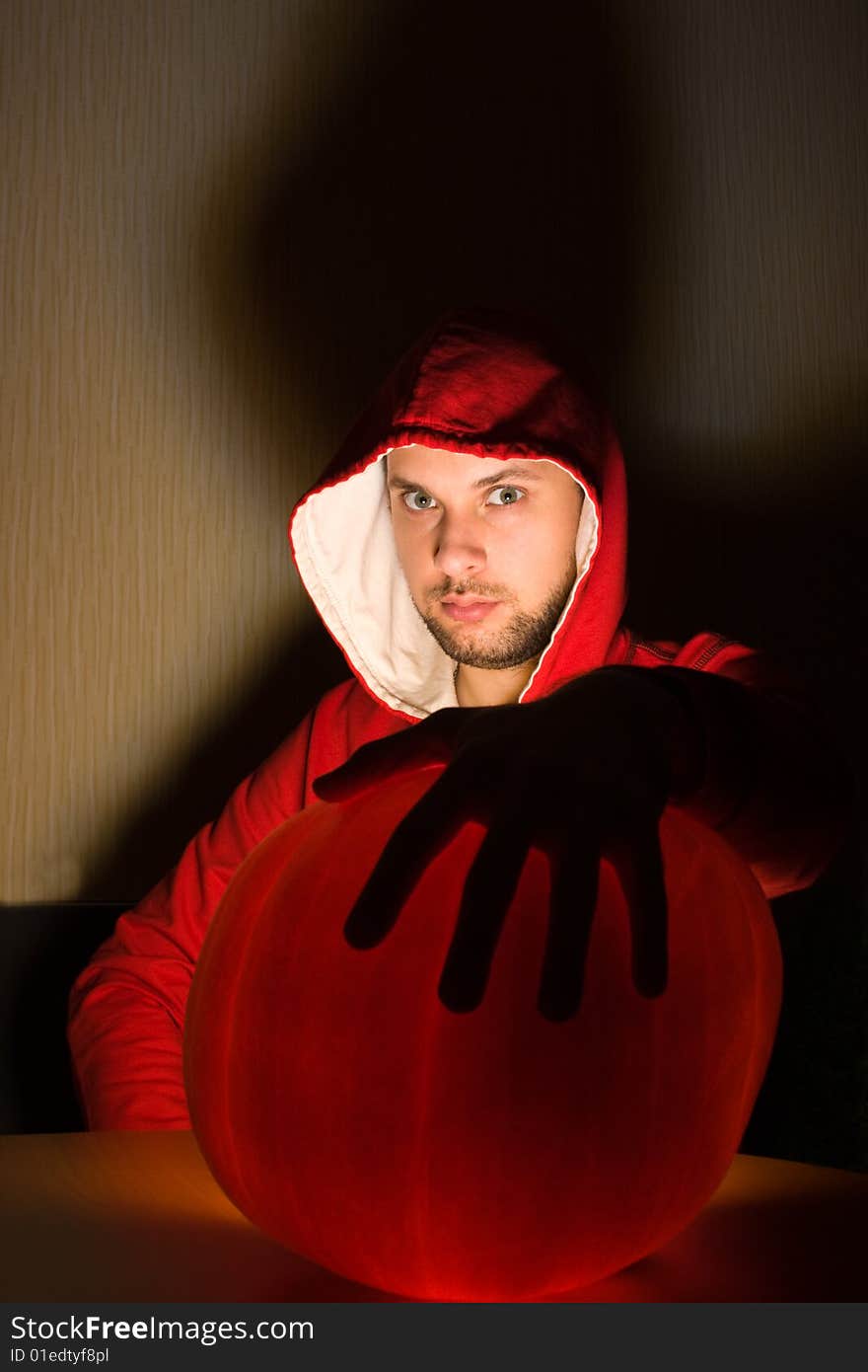 Awesome man holds ball of light in his hands. Awesome man holds ball of light in his hands