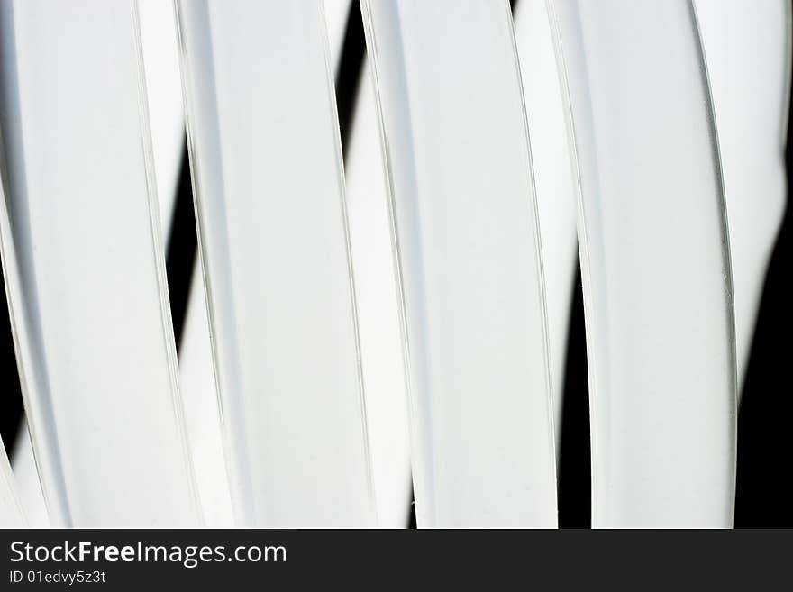 Abstract black and white background (closeup of an energy-saving lamp)