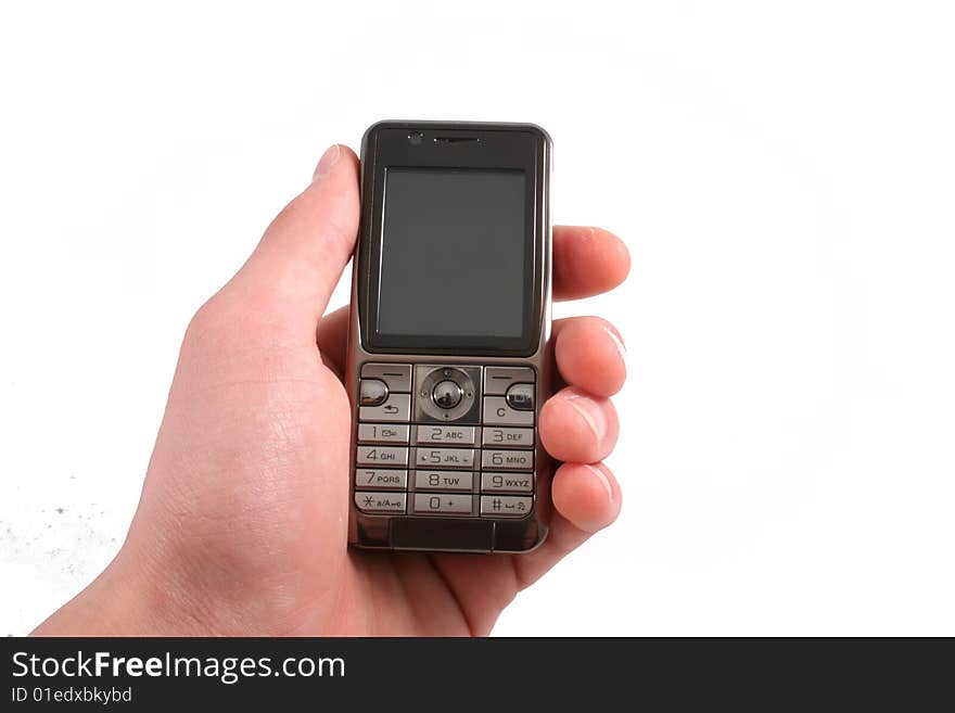 Mobile phone isolated on white. Hand is holding or pushing a button.