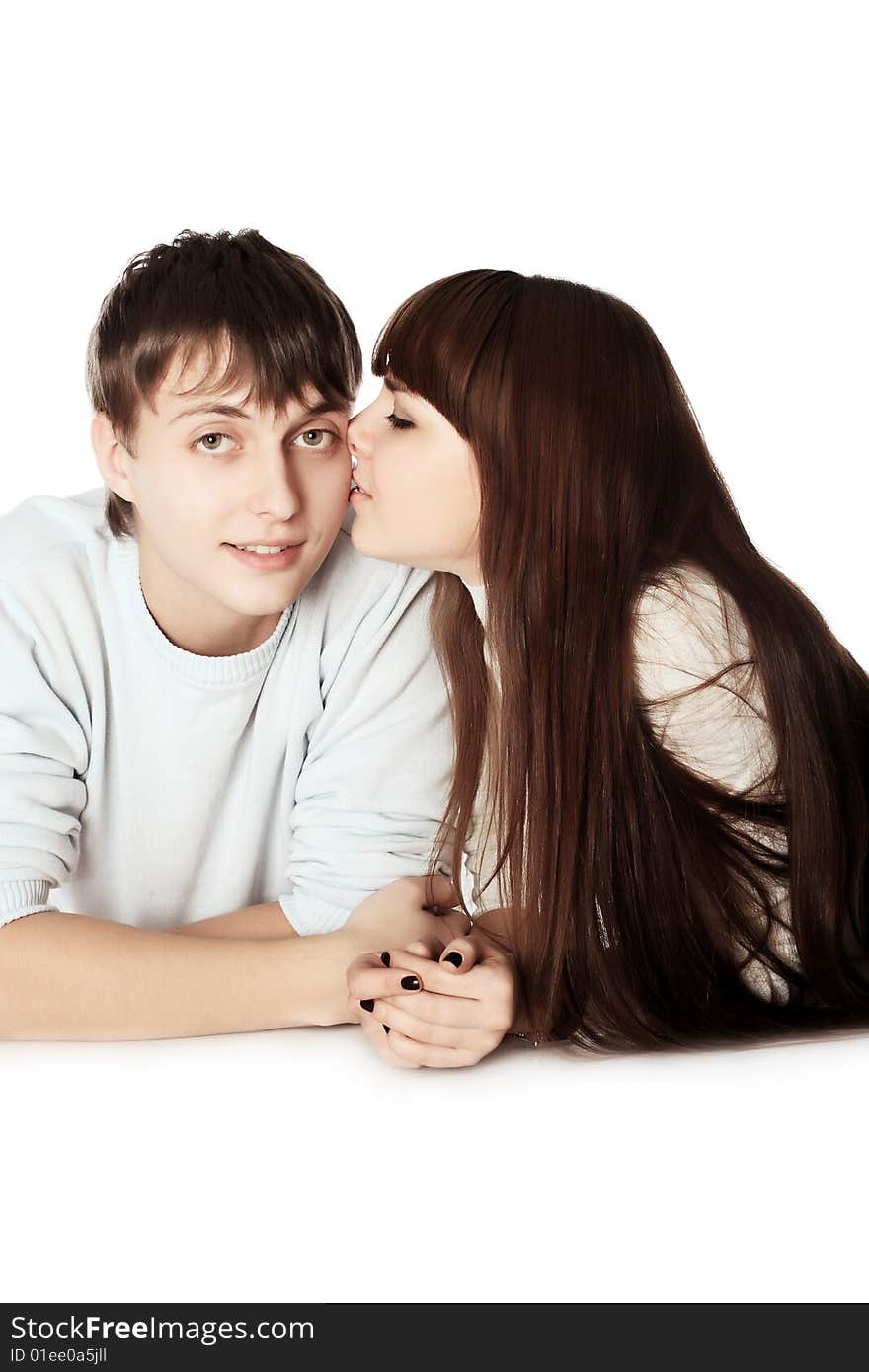 Portrait of young people in love. Shot in a studio. Portrait of young people in love. Shot in a studio.