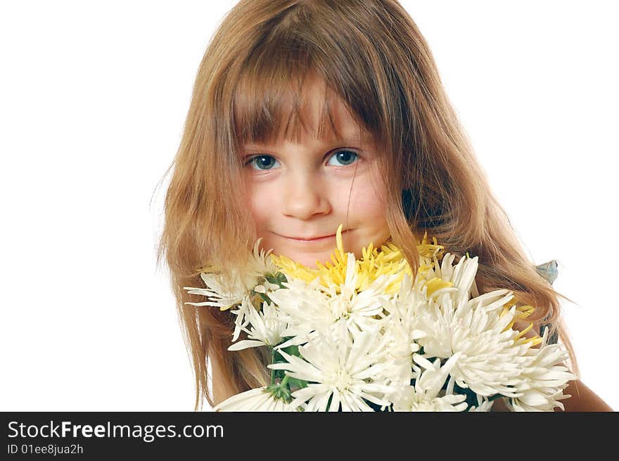 Beautiful little girl with a bunch of flowers and a pental in her lips. Copy Space. Beautiful little girl with a bunch of flowers and a pental in her lips. Copy Space.