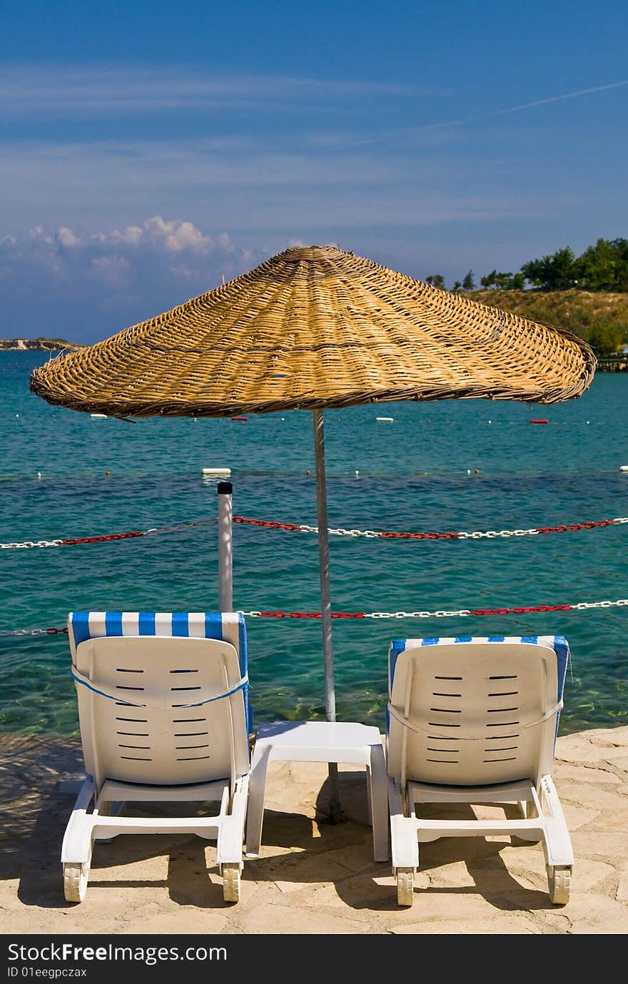 Sunshades in Turkish resort in the Aegean sea