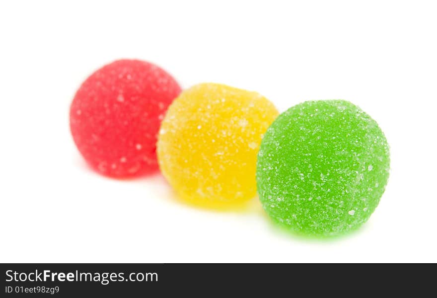 Sweet fruit color candy on white background