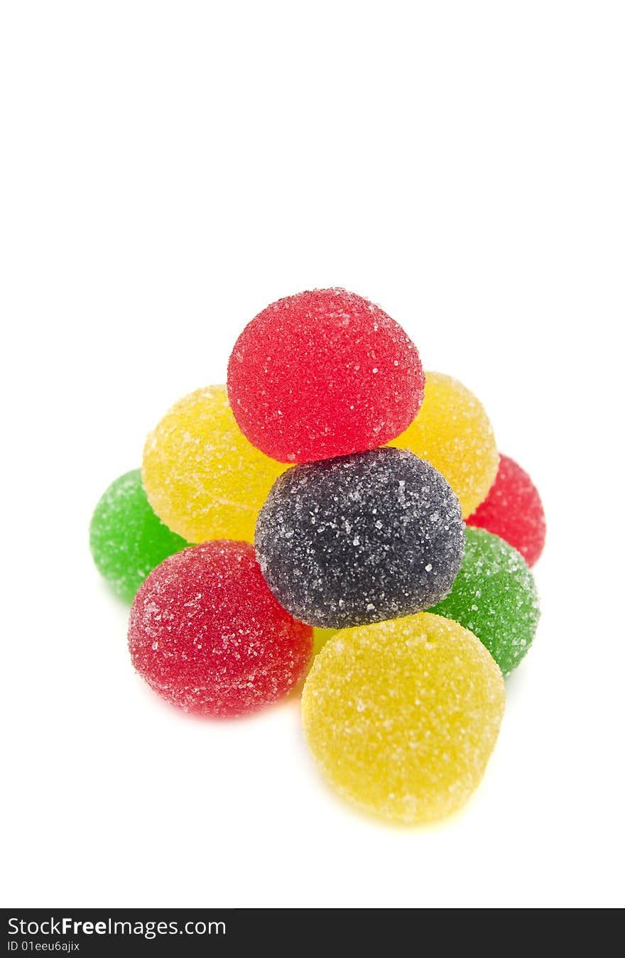 Sweet fruit color candy on white background