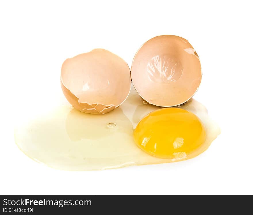 Cracked egg closeup on isolated white background