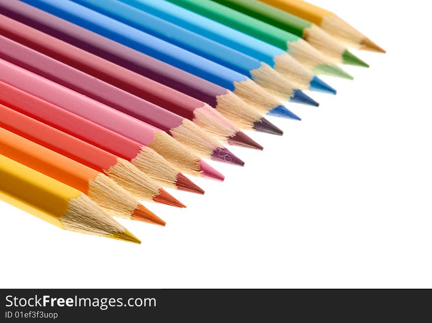 Row of pencils isolated on white background