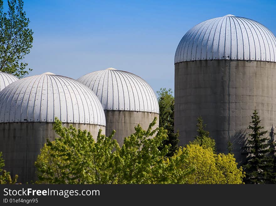 Group of agricultural urban futuristic style towers at the Ontario island. Group of agricultural urban futuristic style towers at the Ontario island