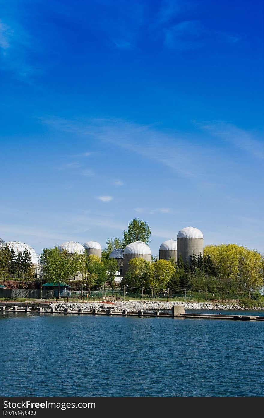 Group of agricultural urban futuristic style towers at the Ontario island. Group of agricultural urban futuristic style towers at the Ontario island