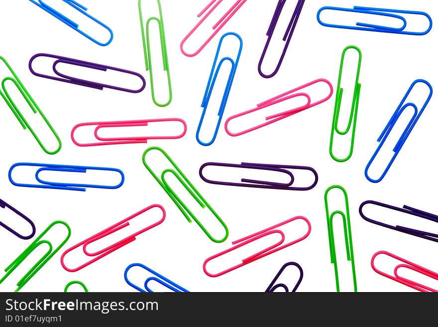 Disordered multicolored paper clips isolated on white background. Disordered multicolored paper clips isolated on white background