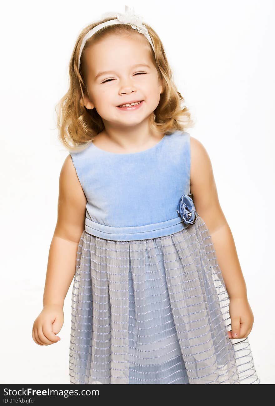 Lovely little girl in blue dress