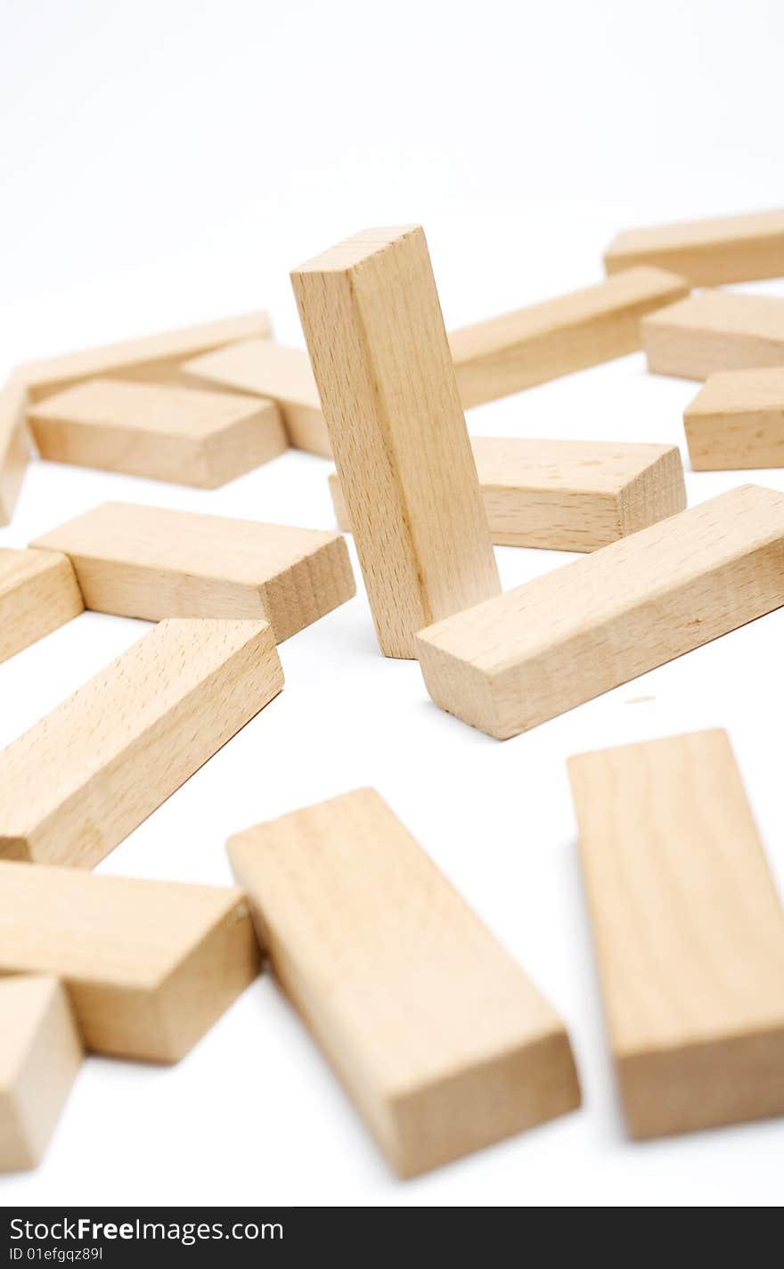 building concept; wooden pieces on white. building concept; wooden pieces on white