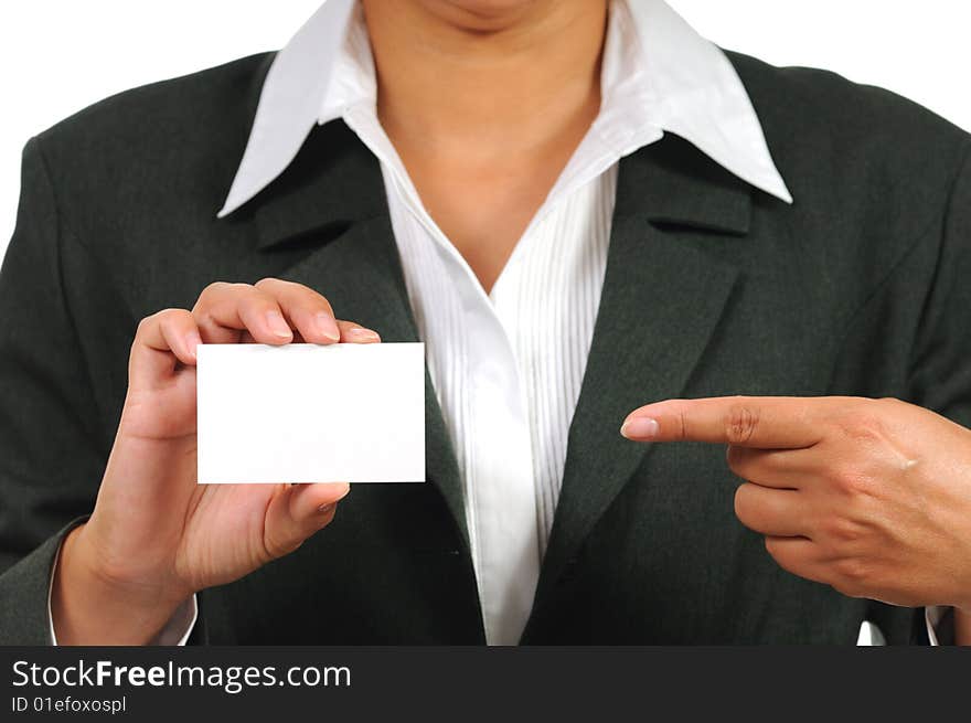 Businesswoman in suit holding empty business card. Isolated on white.