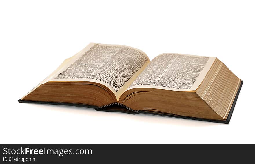 Opened book isolated on white background with clipping path. Studio work.