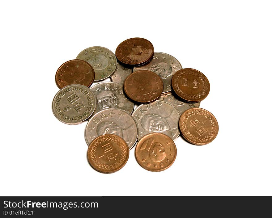 Hong Kong coins in a small pile on a white background