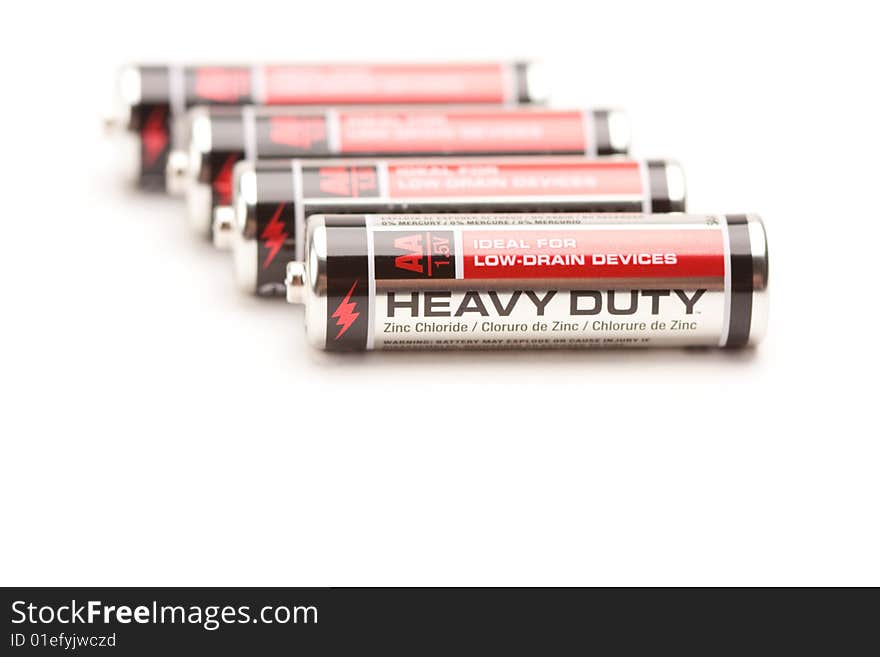 Heavy Duty AA Batteries on a White Background. Heavy Duty AA Batteries on a White Background.