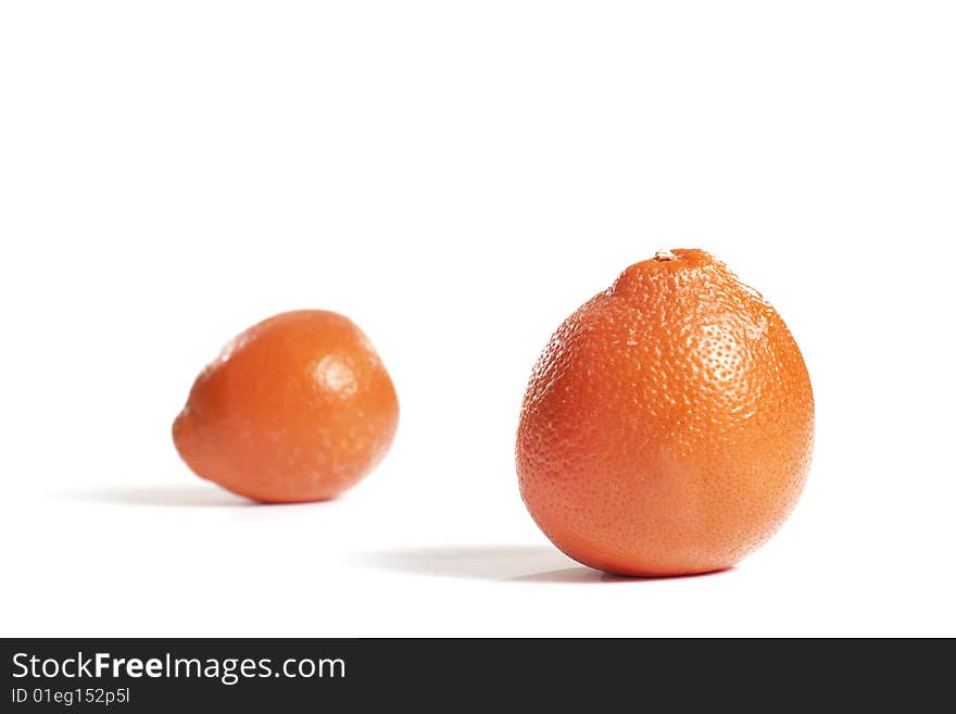 A pair of oranges isolated on white. A pair of oranges isolated on white.