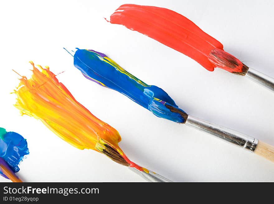 Stock photo: an image of  paintbrushes painting wide stripes