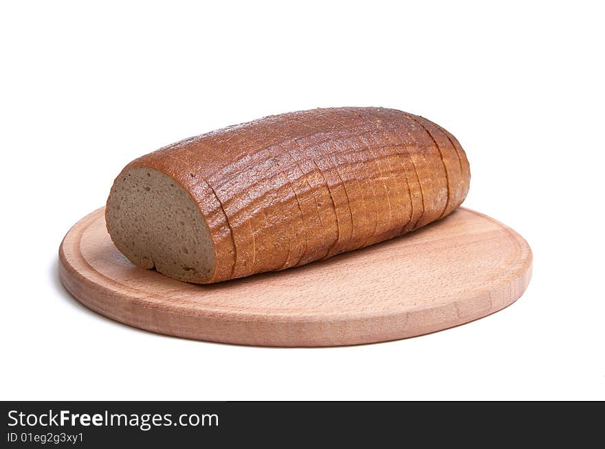 Long loaf and round board isolated on a white background. Long loaf and round board isolated on a white background.