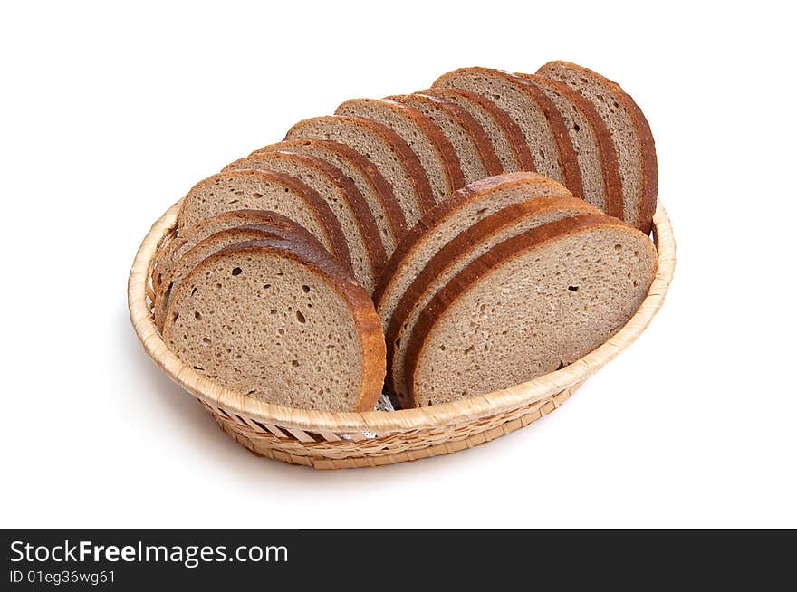 Pieces of bread in the basket isolated on a white background. Pieces of bread in the basket isolated on a white background.