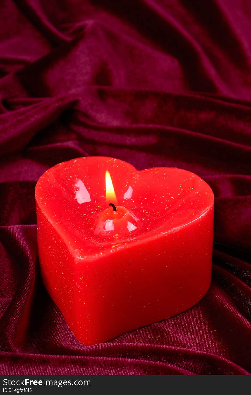 Candle in the form of heart.