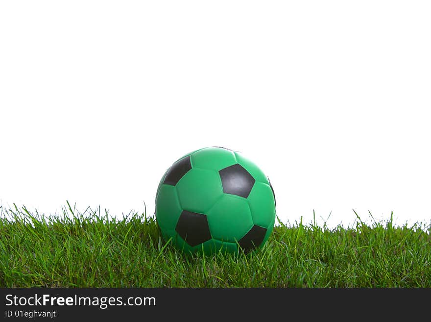 Soccer ball in the studio on grass