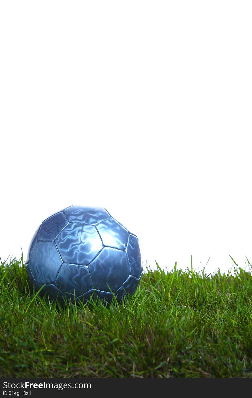 Soccer ball in the studio on grass