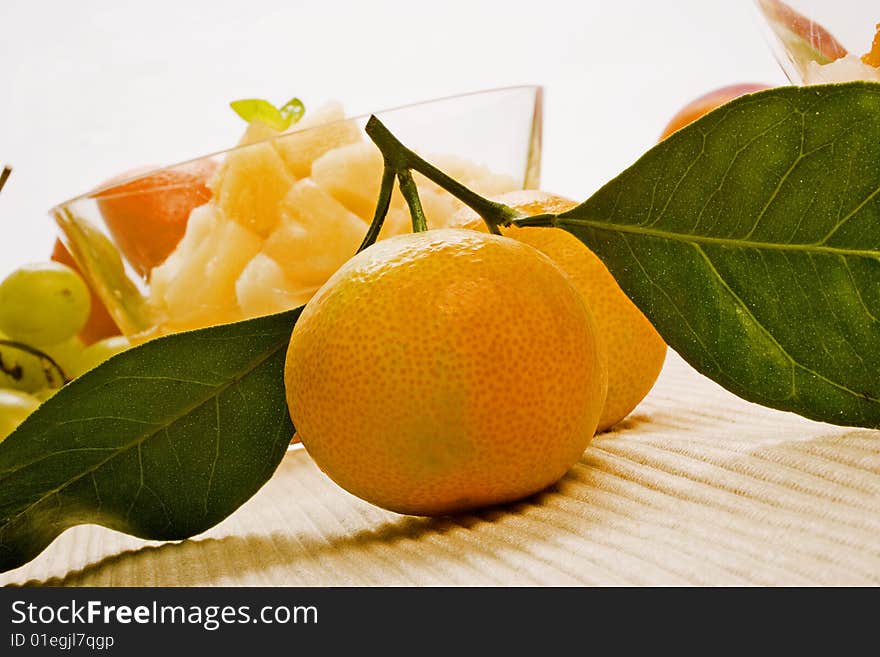 Two mandarins fruit with leaves. Two mandarins fruit with leaves