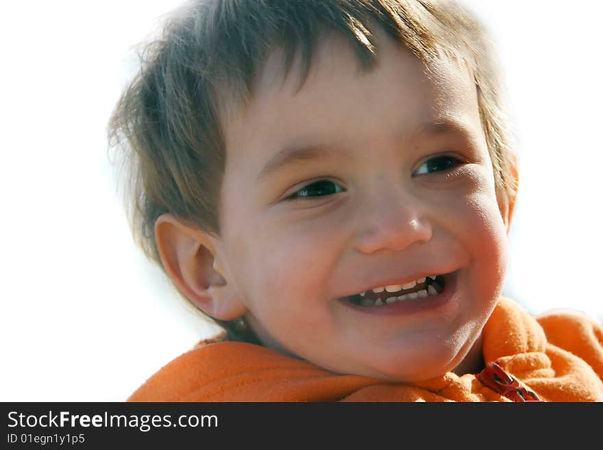 Happy young boy over white. Happy young boy over white