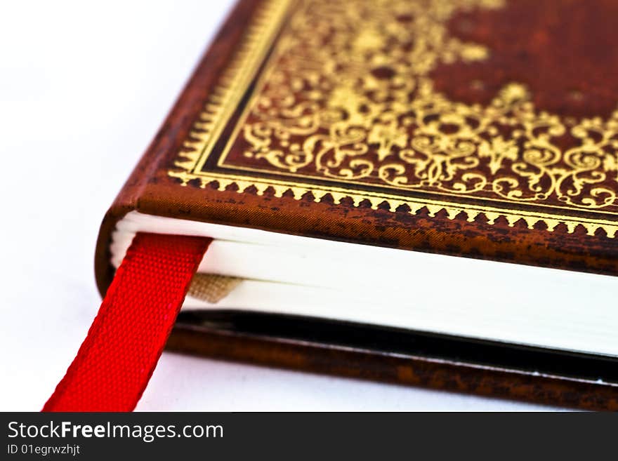 Detail of a red book with ornaments