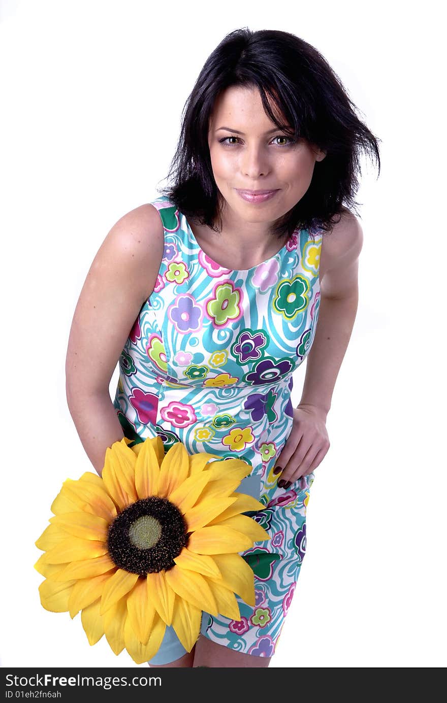 Girl with sunflower isolated on white