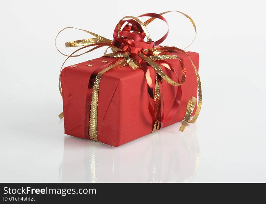 Red box with present inside. Red box with present inside