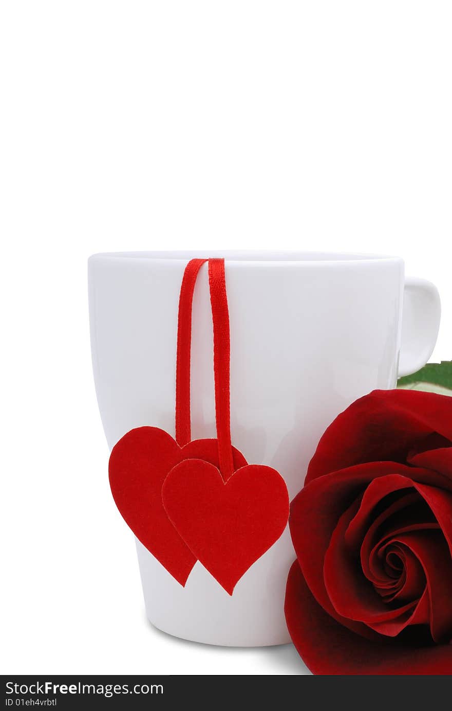 Cup with two red hearts and flower