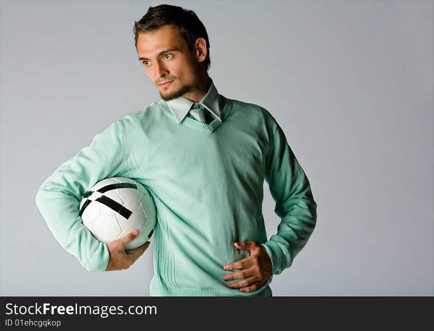 Man Holding Soccer Ball