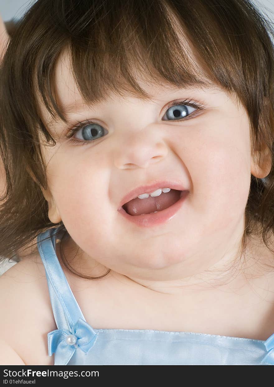 Portrait of blue eyed toddler